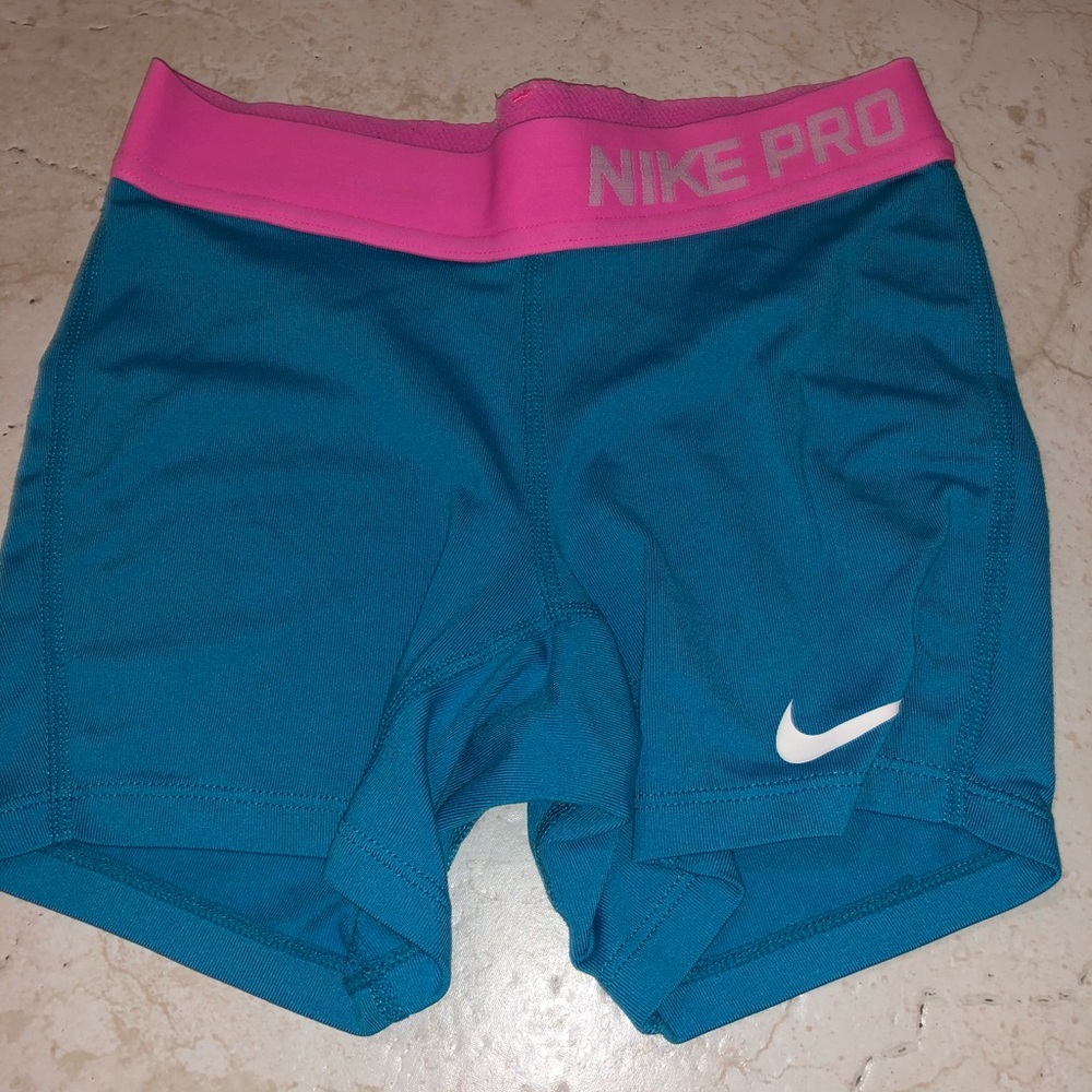 Blue Nike Pros With Pink Band